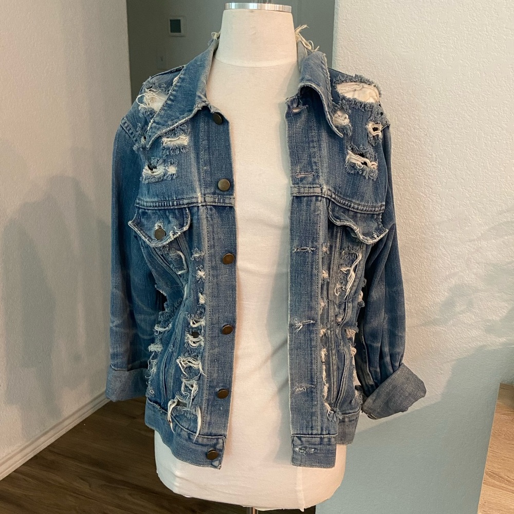 Vintage ripped denim trucker jacket